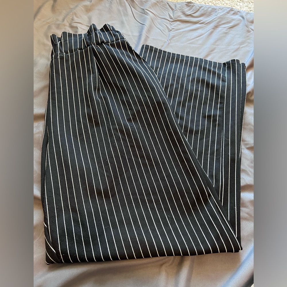 A black and white stripe work pair of pants